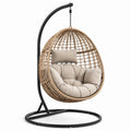 Chaise suspendue en rotin avec coussin beige et support métallique